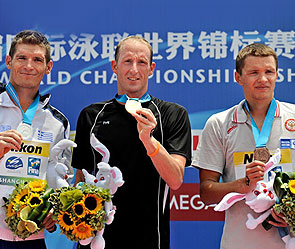 Спирос Гианниотис, Томас Лурц, Евгений Дратцев. Фото: shanghai-fina2011.com