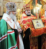 Путин подарил патриарху икону