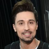 Билан появился на публике с эффектной красоткой