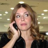 Толкалина заявилась на пляж в шубе