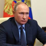Биограф Путина назвал причину напряженных отношений президента с Меркель